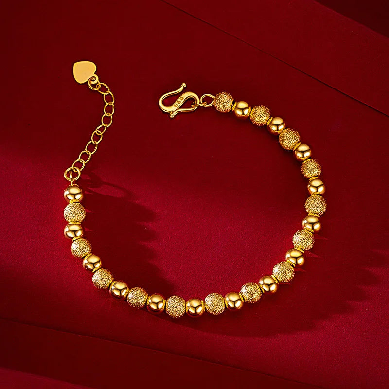 Pulsera Esferas Doradas AURFU • Esencia de Luz chapada en oro 18K