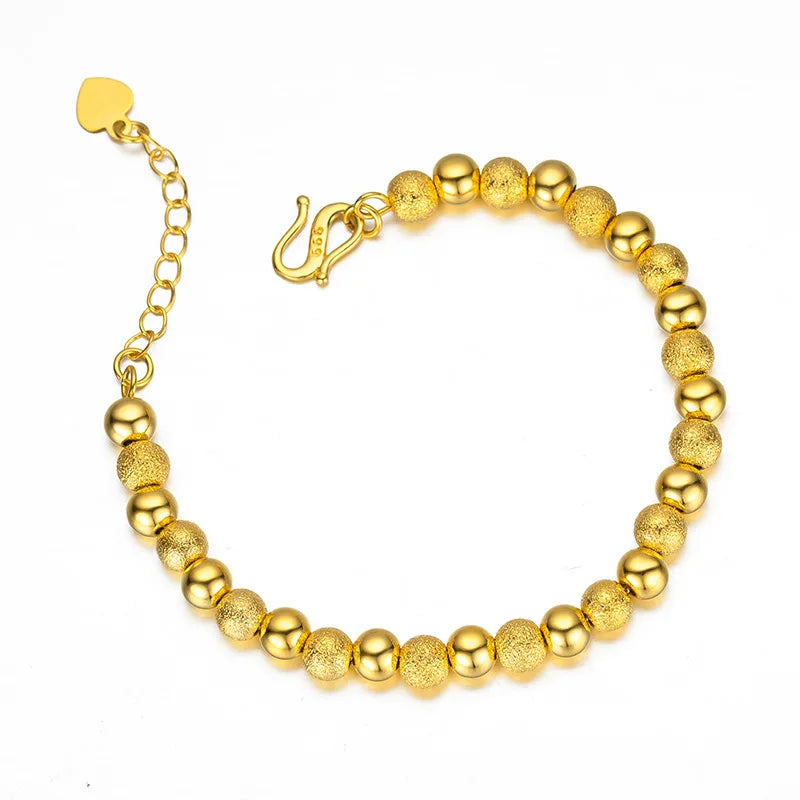 Pulsera Esferas Doradas AURFU • Esencia de Luz chapada en oro 18K