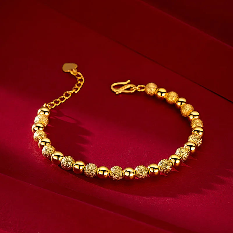 Pulsera Esferas Doradas AURFU • Esencia de Luz chapada en oro 18K