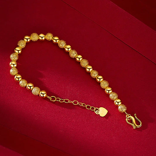 Pulsera Esferas Doradas AURFU • Esencia de Luz chapada en oro 18K